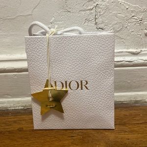 Dior empty mini box and shopping with ribbons and original tissue.